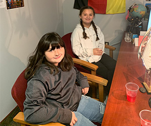 two female students in chairs