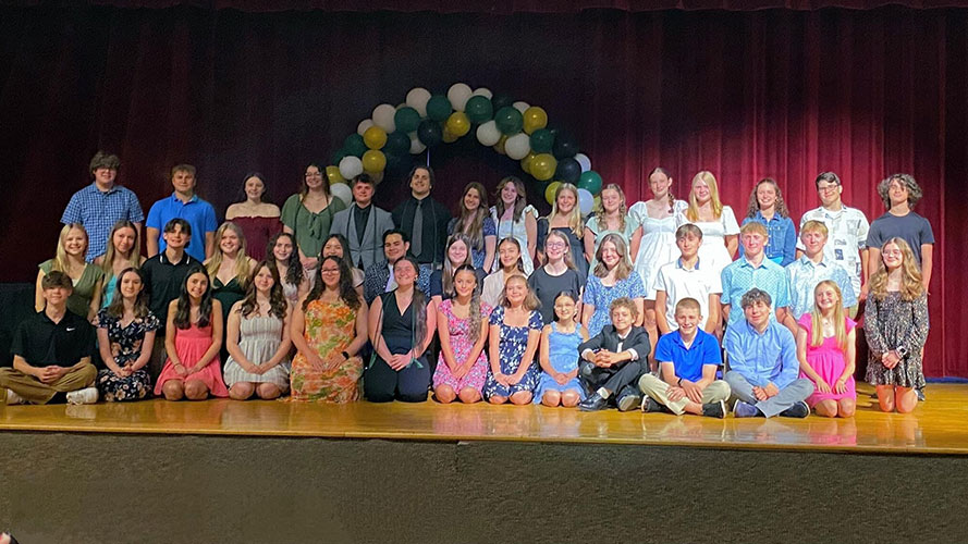 Student group photo on stage