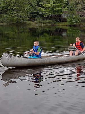 Two boys in canoe 