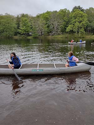 Two girls in a canoe