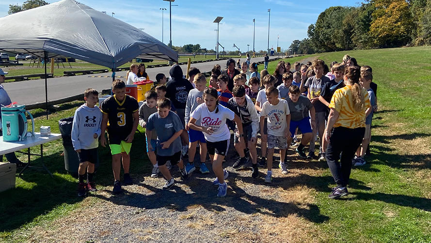 Students outside starting a race