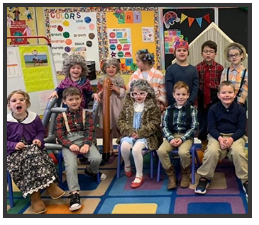 students dressed as elders