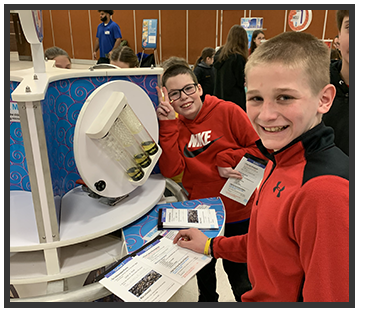 Students looking at science projects