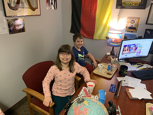 Two students smiling for the camera