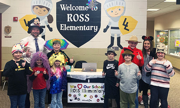 Students and staff posing with their crazy hats