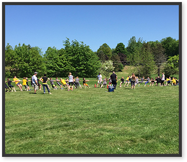 Students outside enjoying a fitness activity