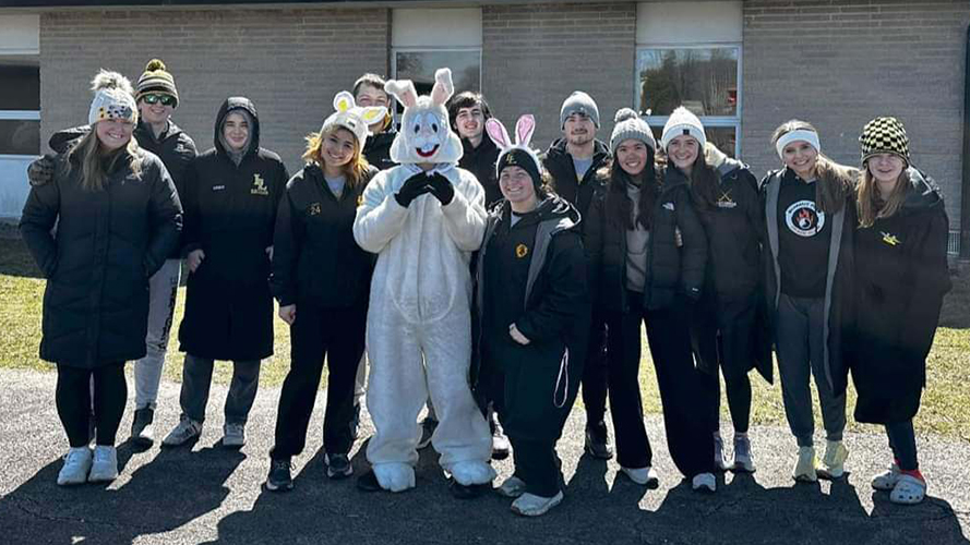 Group of students outside with the Easter bunny