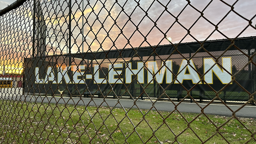 Lake-Lehman sign behind athletic fencing